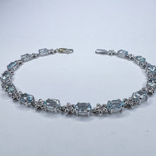 Load image into Gallery viewer, 10k White Gold 5 CT T.W. Aquamarine Tennis Bracelet 7.15" Flower Bracelet 5.7g