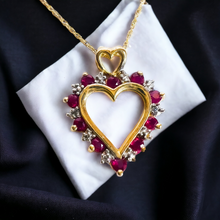 Load image into Gallery viewer, Would make a great Christmas Gift, Valentines Day Gift, anniversary gift for wife, girlfriend, etc! We also sell 10k, 18k, and 14k jewelry, engagement rings, wedding rings, promise rings, Christmas gifts, April birthstone rings, birthday gifts, Valentine’s Day gifts, fall fashion jewelry, diamond rings, sapphire jewelry, ruby & emerald pendants, necklaces, bracelet, earrings, chain, luxury, Mothers Day Gift, Birthstone Ruby Diamond Heart Necklace 10k Gold