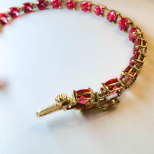 Load image into Gallery viewer, 10k Yellow Gold Padparadscha Sapphire Tennis Bracelet 7.25&quot; 18.5ct Diamonds 9.4g
