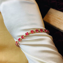 Load image into Gallery viewer, 10k Yellow Gold Padparadscha Sapphire Tennis Bracelet 7.25&quot; 18.5ct Diamonds 9.4g

